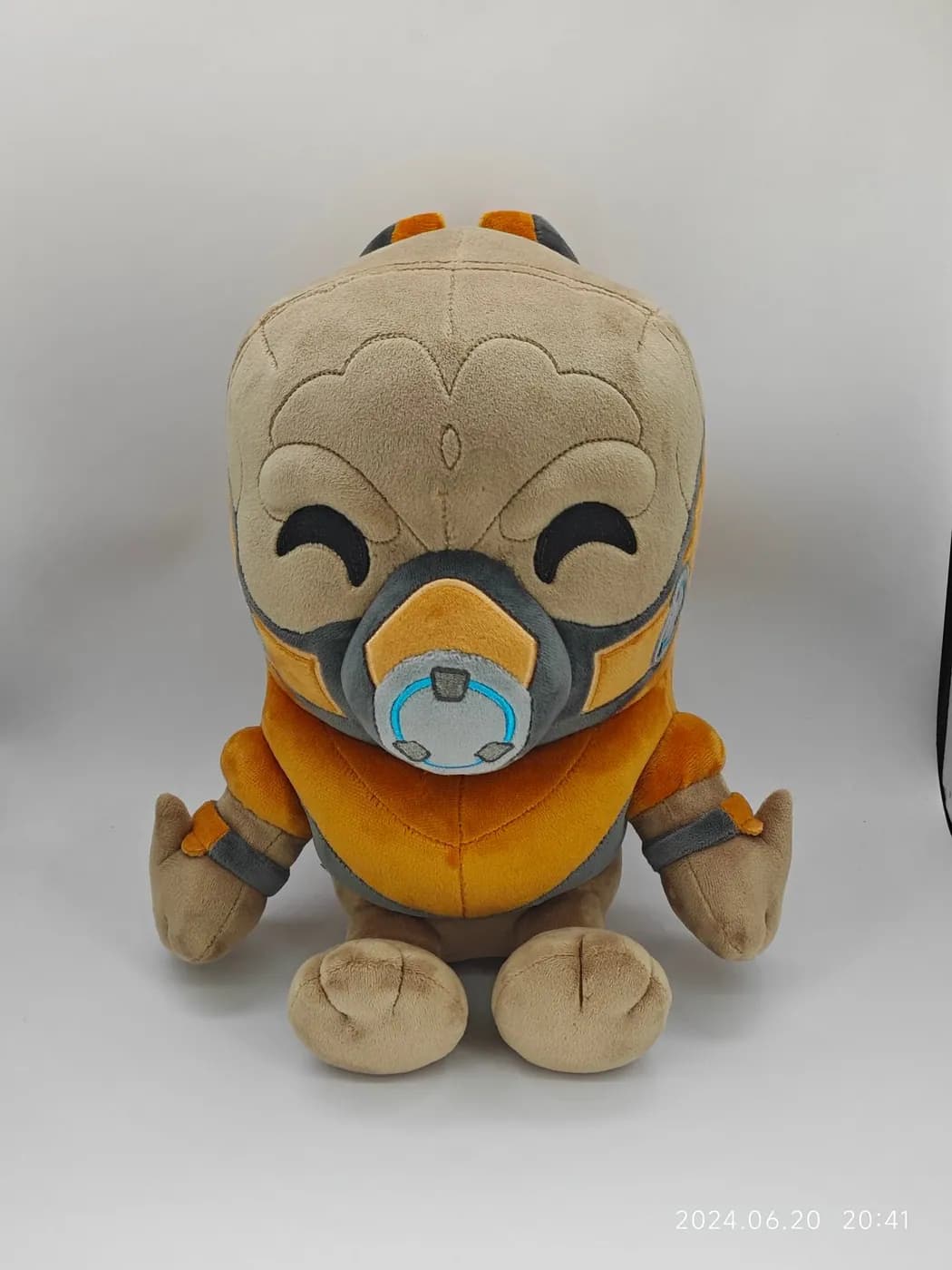Character plush in a moulded mask and printed armour