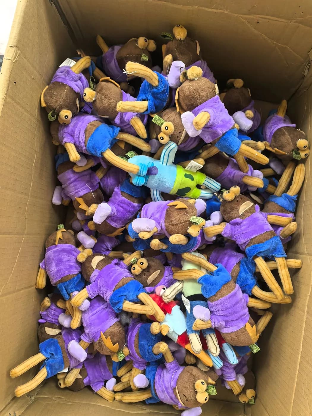 Bulk run of purple and yellow character charms