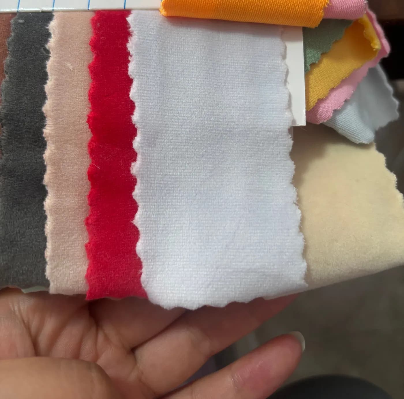 Plush fabric swatch card in bright colourways