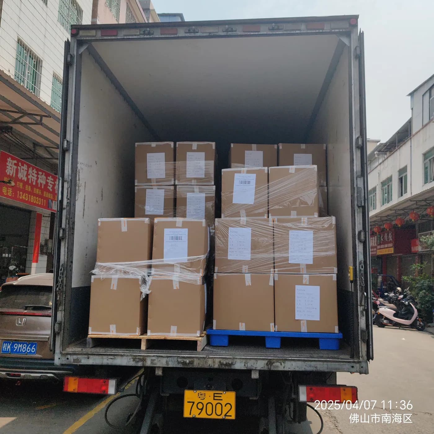 Export cartons loaded into a truck at the loading bay